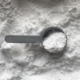 black magnifying glass on white and brown marble table